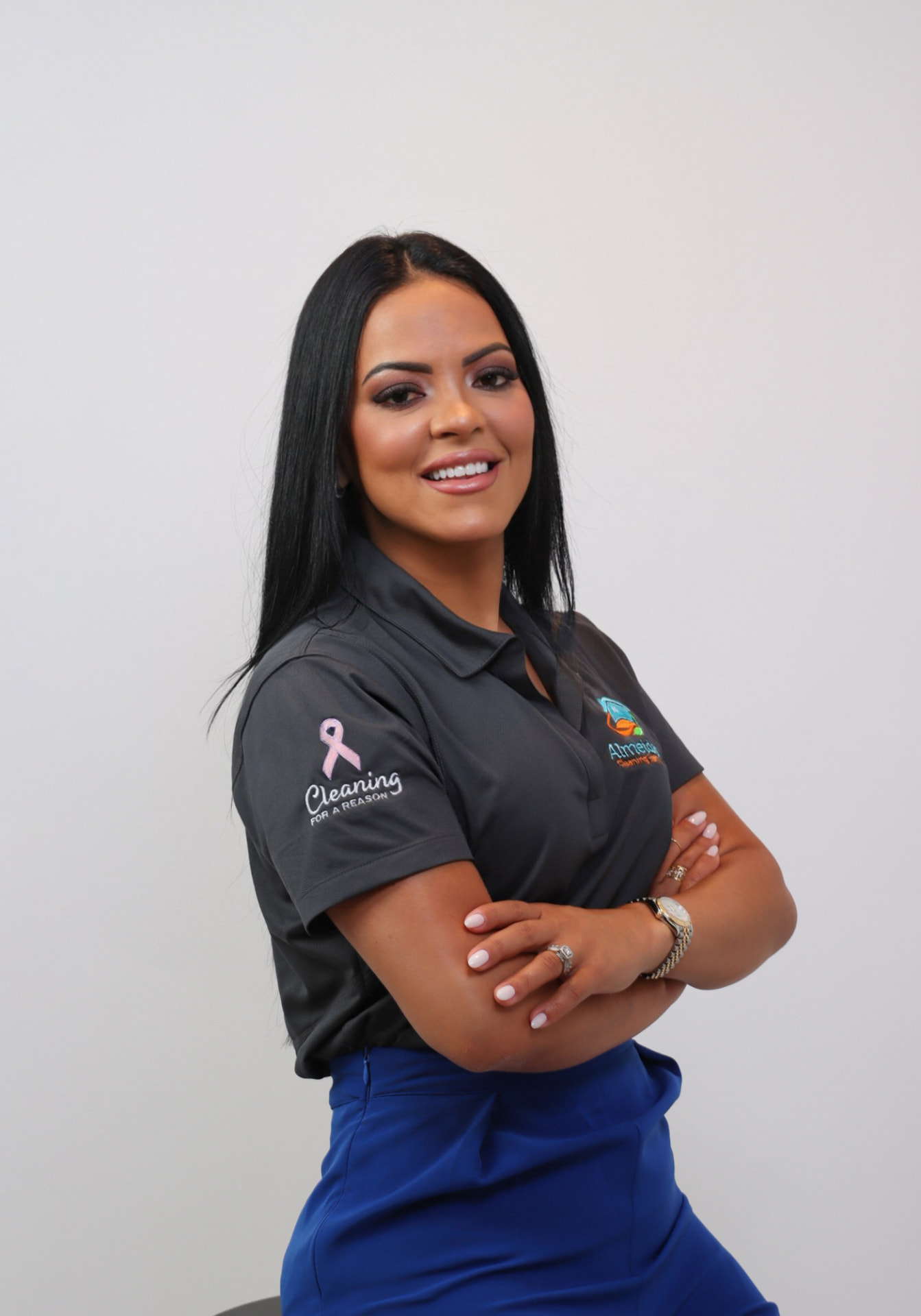 Almeida's Cleaning Services team member wearing a Cleaning for a Reason polo shirt